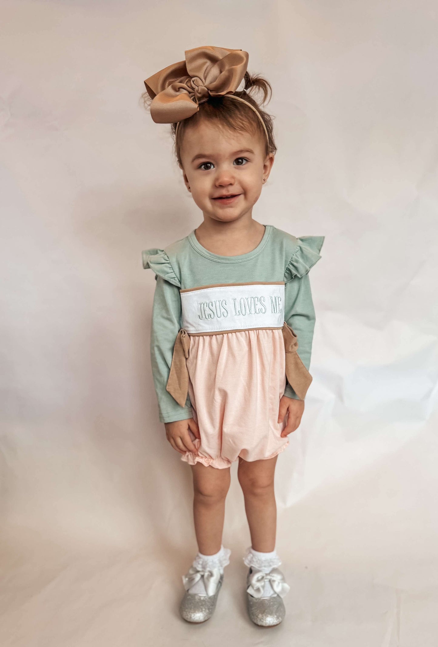 Jesus Loves Me Smocked Bubble Romper