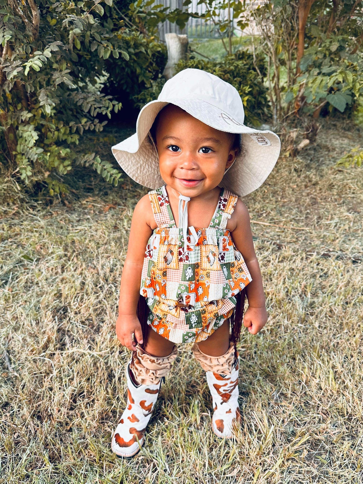 Brown & White Cow Print Tanner Mark Boots