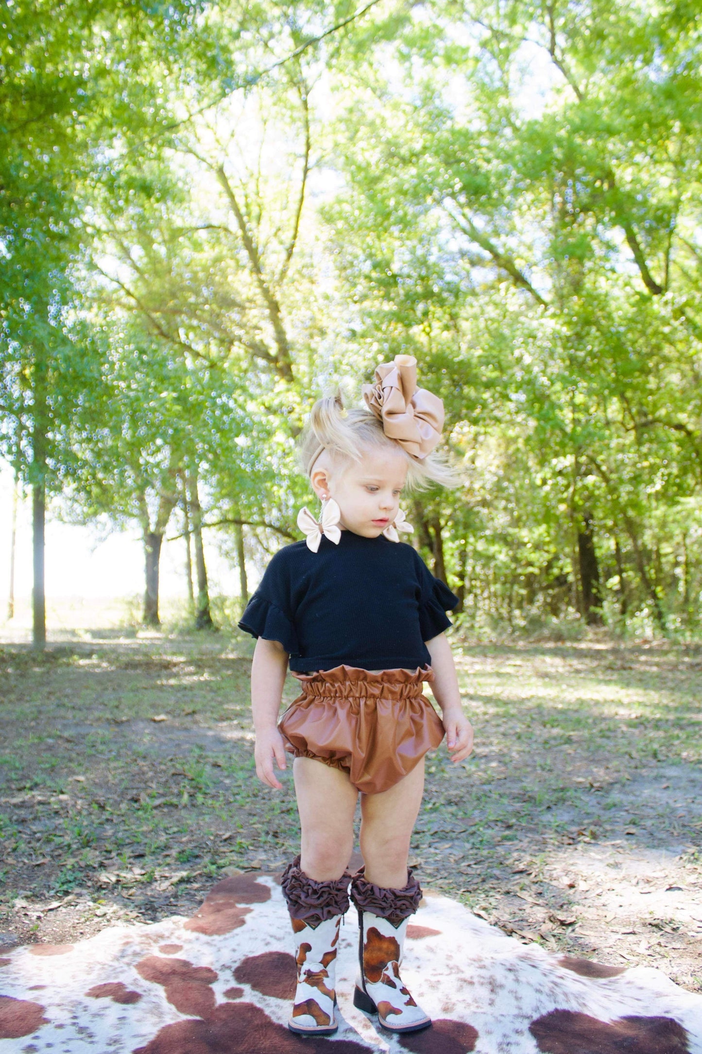 Brown & White Cow Print Tanner Mark Boots